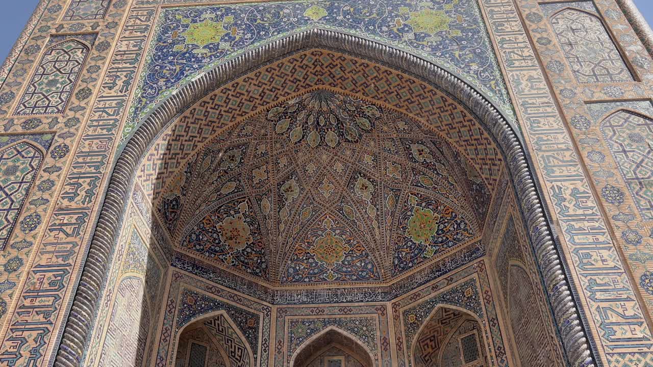 4K Orbiting Shot of Tilla-Kari Madrasa's Opulent Mosaic Portal in Registan Square, Samarkand