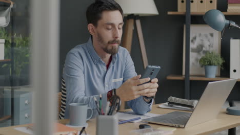man working from home on phone