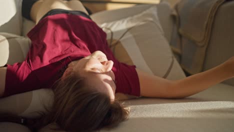 woman relaxing on a sofa