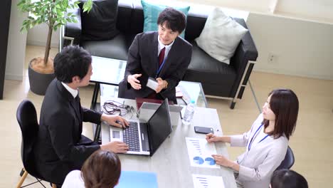 business persons working in an office