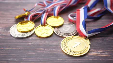 medals on wooden surface