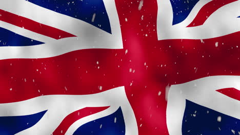 waving national flag of united kingdom with snowfall vfx in foreground