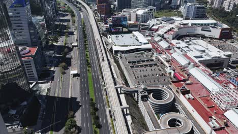 aerial view of mexico city highway and shopping mall