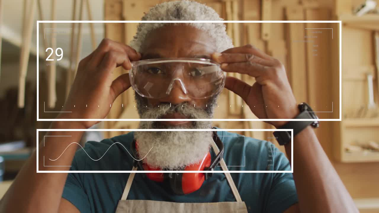Male carpenter reaching for goggles securing over eyes while HUD tracking hands preparing for work