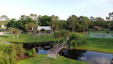 pull away from lakeside park with bridge, tennis courts and gazebo