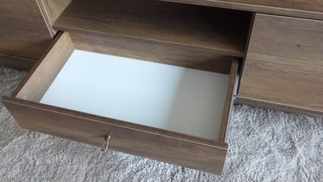 empty wooden tv stand drawer