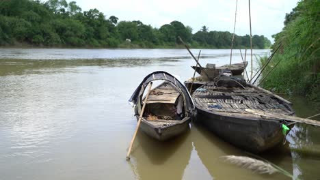 boats are moored at the river