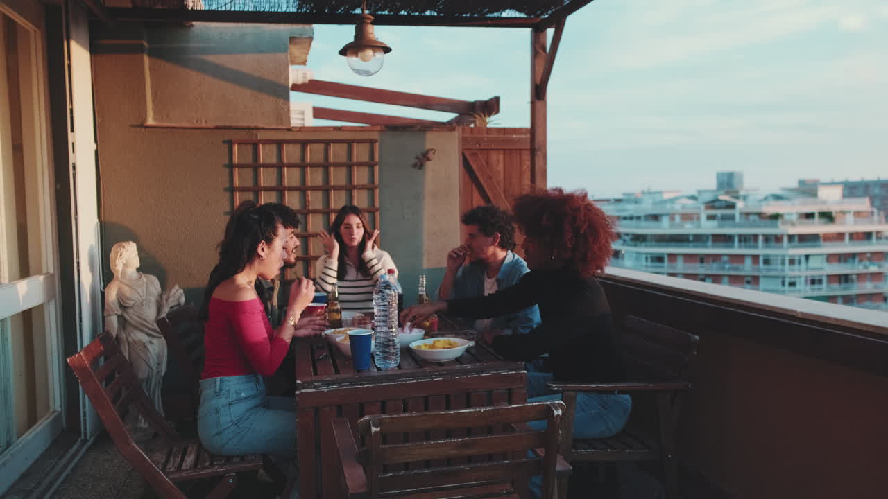 Friends enjoying a rooftop party