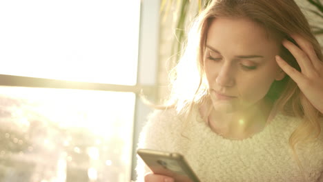 unhappy woman texting message on mobile. annoyed woman with smartphone