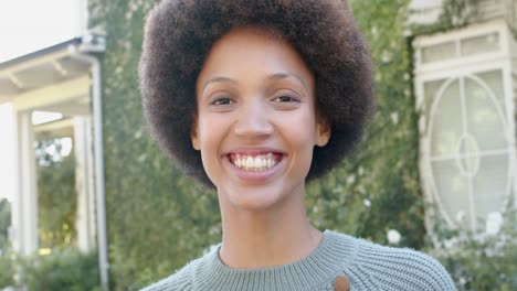 Portrait-of-happy-african-american-woman-in-garden