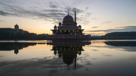 dramatic sunrise at putra mosque, putrajaya