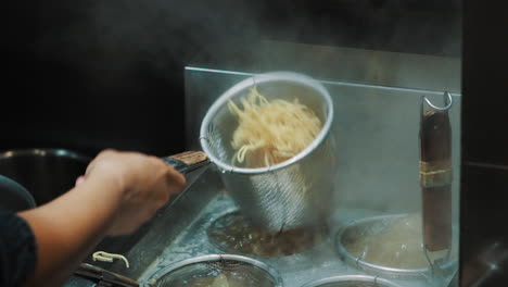 cooking ramen noodles , slow motion