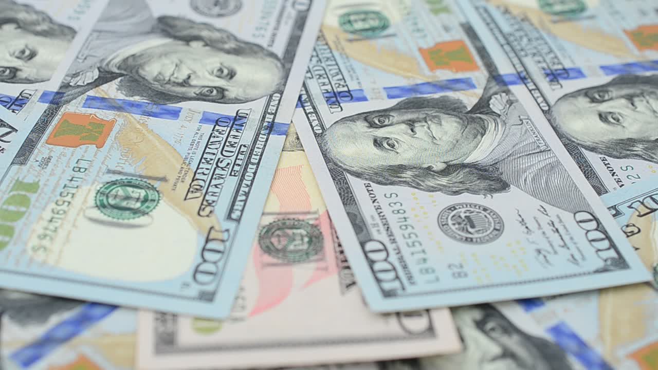 Dollar banknotes. Shooting of money