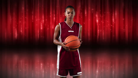 female basketball player against red background