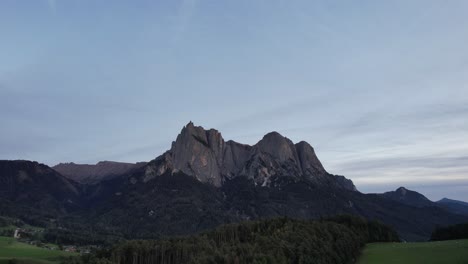 PAN-UP-TO-REVEAL-TOWN-DRONE-SHOT-OF-BOLZANO-4K