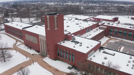 high aerial above school college academic building during winter