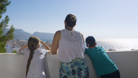 family enjoying a coastal view