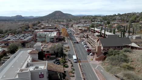 downtown sedona, arizona with cars driving and drone video stable