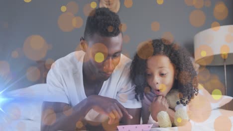 animation of spots over african american father with daughter smiling