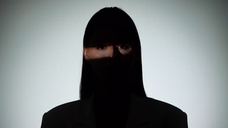 series of silhouetted portraits revealing anonymous woman's features