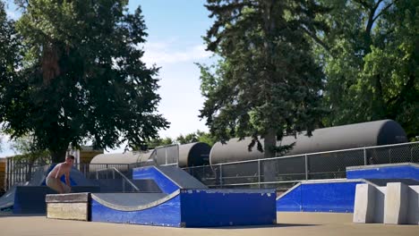 skater does a 360 off of a wavy ledge
