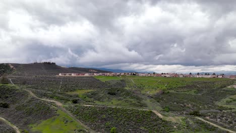 Dynamic-cloudscape-over-Santa-Clarita,-California---aerial-hyper-lapse