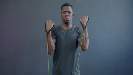 man exercising with resistance bands