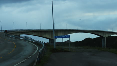 slow motion shot of cars driving over the rongesundet bru