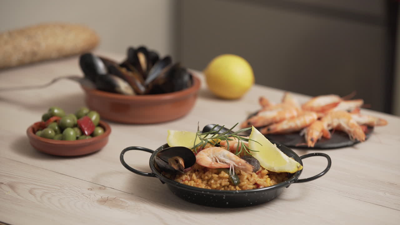 Paella traditional Spanish food, served on tapa plate