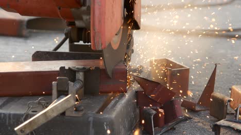 cutting steel channel (steel c chanel) with grinder. sparks while grinding iron