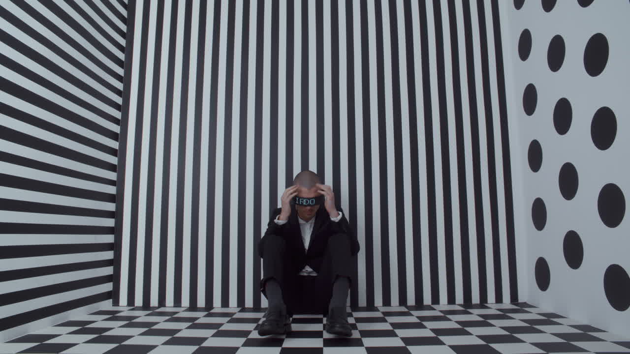 Depressed Businessman in Optical Illusion Room