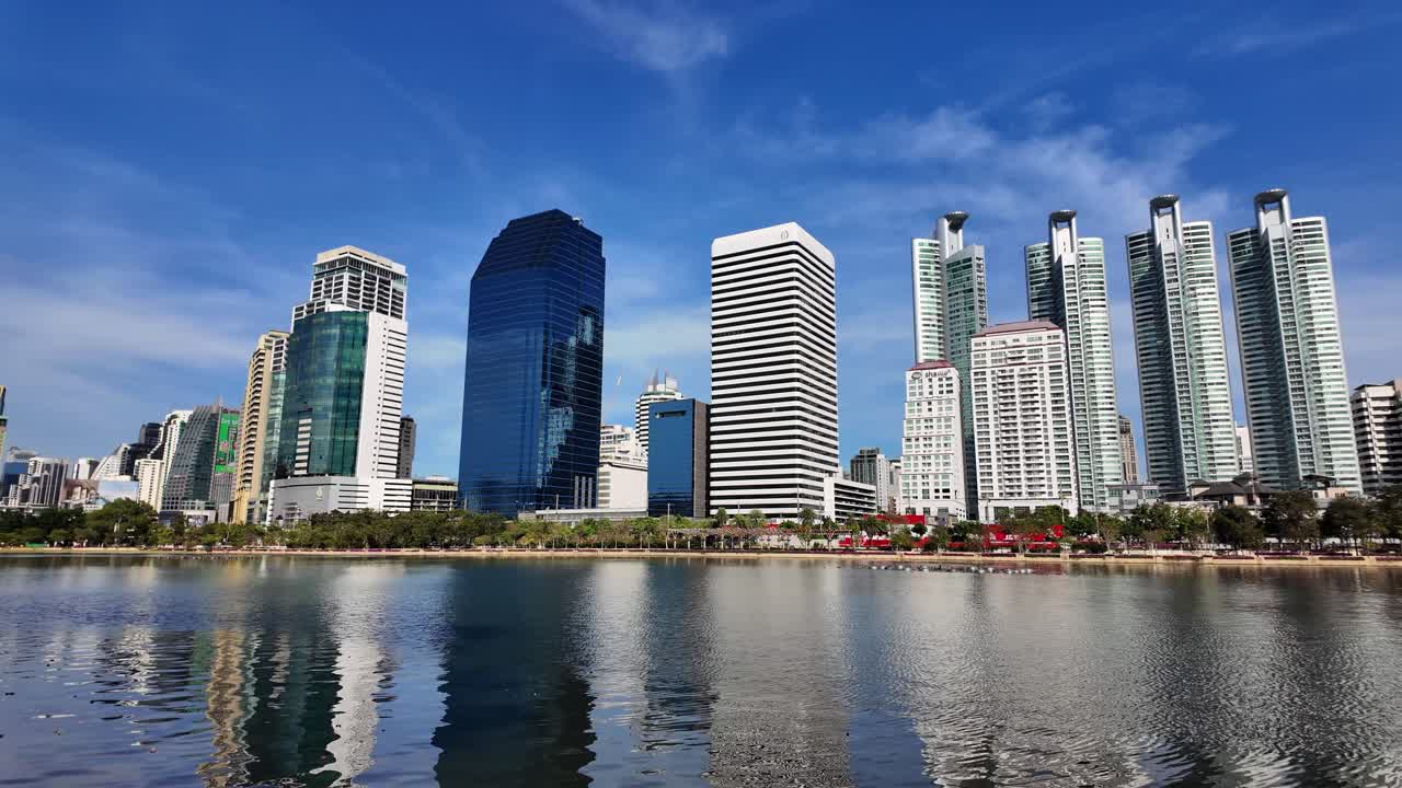 Bangkok modern city buildings skyline view from Benjakitti park Thailand
