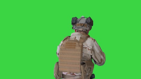 united states ranger walking with assault rifle on a green screen, chroma key