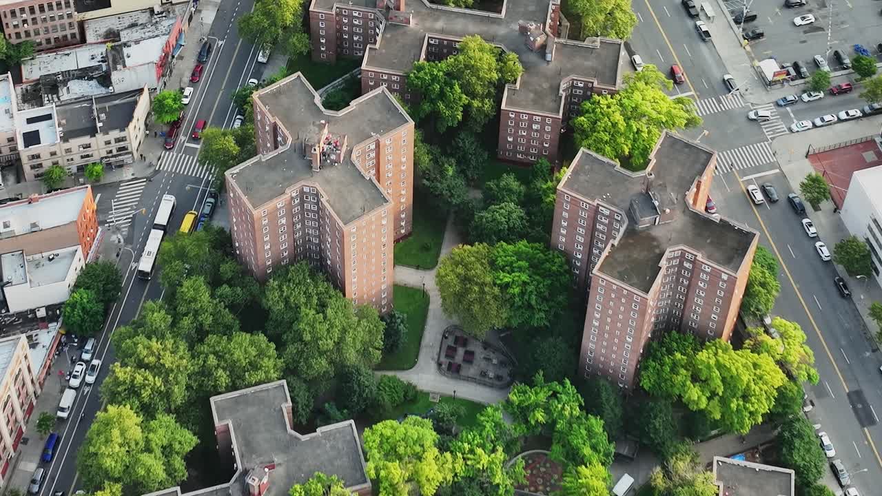 Bird's eye view of residential buildings surrounded by greenery in New York