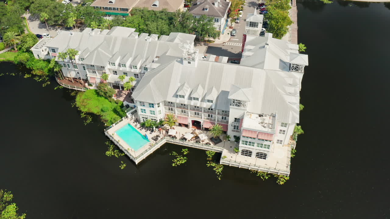 Flying Over White Bohemian Marriott Hotel In Celebration, Florida.
Aerial Drone Shot Over The Lake.