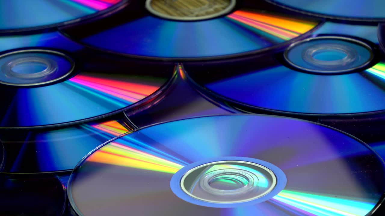 Rotating shiny DVD compact discs background