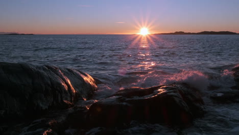 mysterious dark ocean rippling at beautiful golden sunset