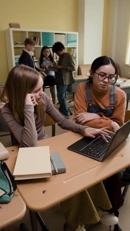 students working and studying in a classroom