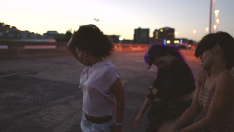 Happy-diverse-group-of-young-females-dancing