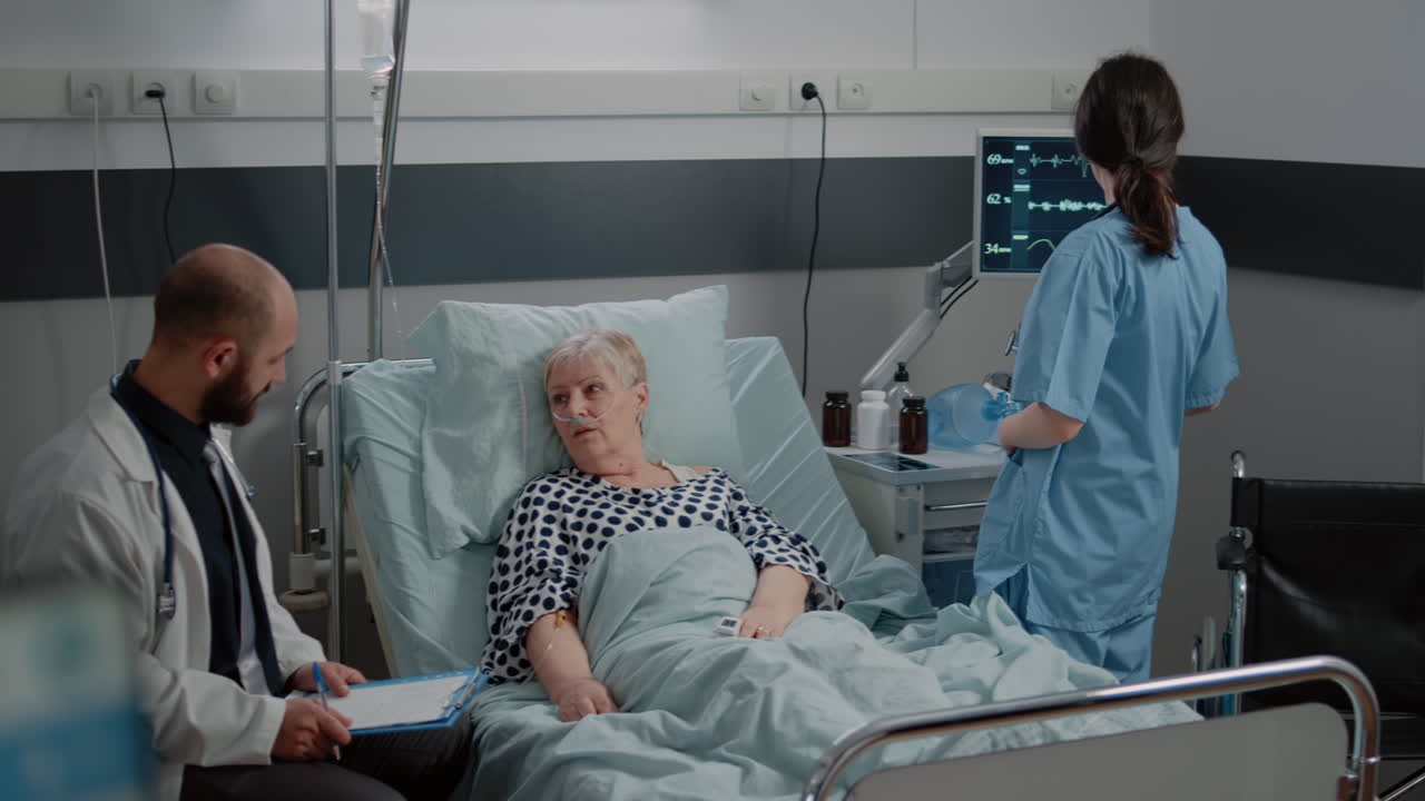 Doctor and nurse doing consultation with retired patient