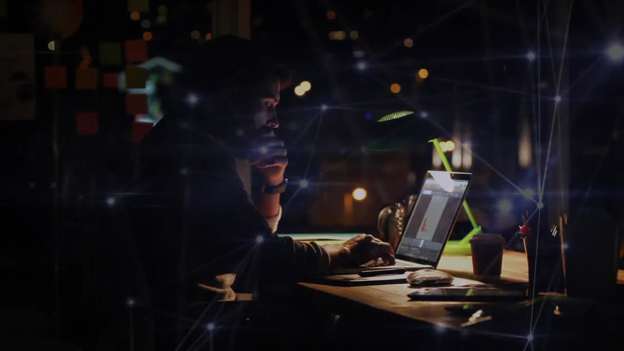 Network connections lines with businessman typing on laptop