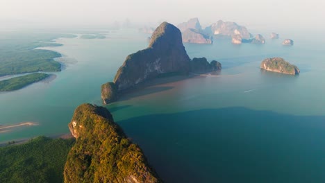 aerial panoramic overview phang nga bay, thailand, stunning limestone karsts, turquoise waters, and islands casting long shadows on ocean