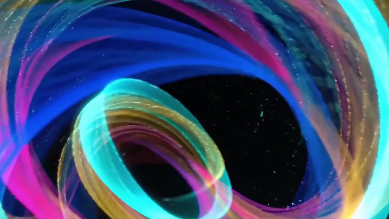 Abstract Motion Graphics Featuring Colorful Light Trails and Kaleidoscopic Patterns