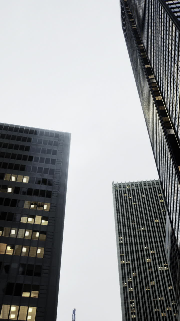 Exploring urban landscapes under a cloudy sky with towering skyscrapers
