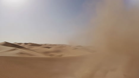 dramatic sandstorm sweeps across desert dunes