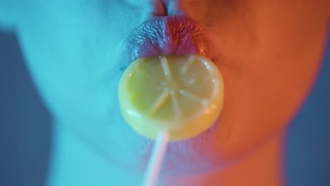 woman seductively licking a lollipop