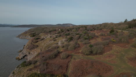 Rise-up-revealing-winter-coastline-landscape-and-mountains-on-horizon-at-Jenny-Brown's-Point-Silverdale-UK