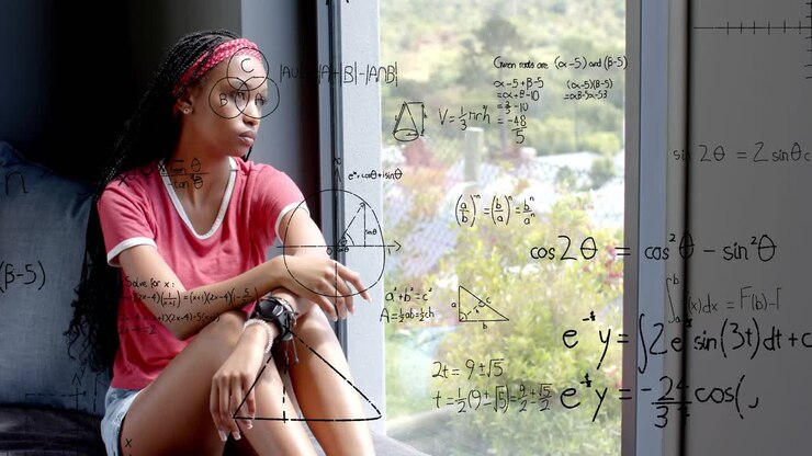 Woman sitting on window seat gazing and turning head, sparking math diagrams on glass for education