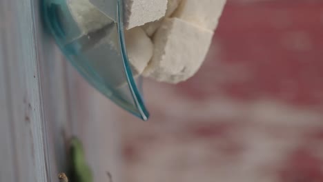 white cheese cubes in a clear bowl