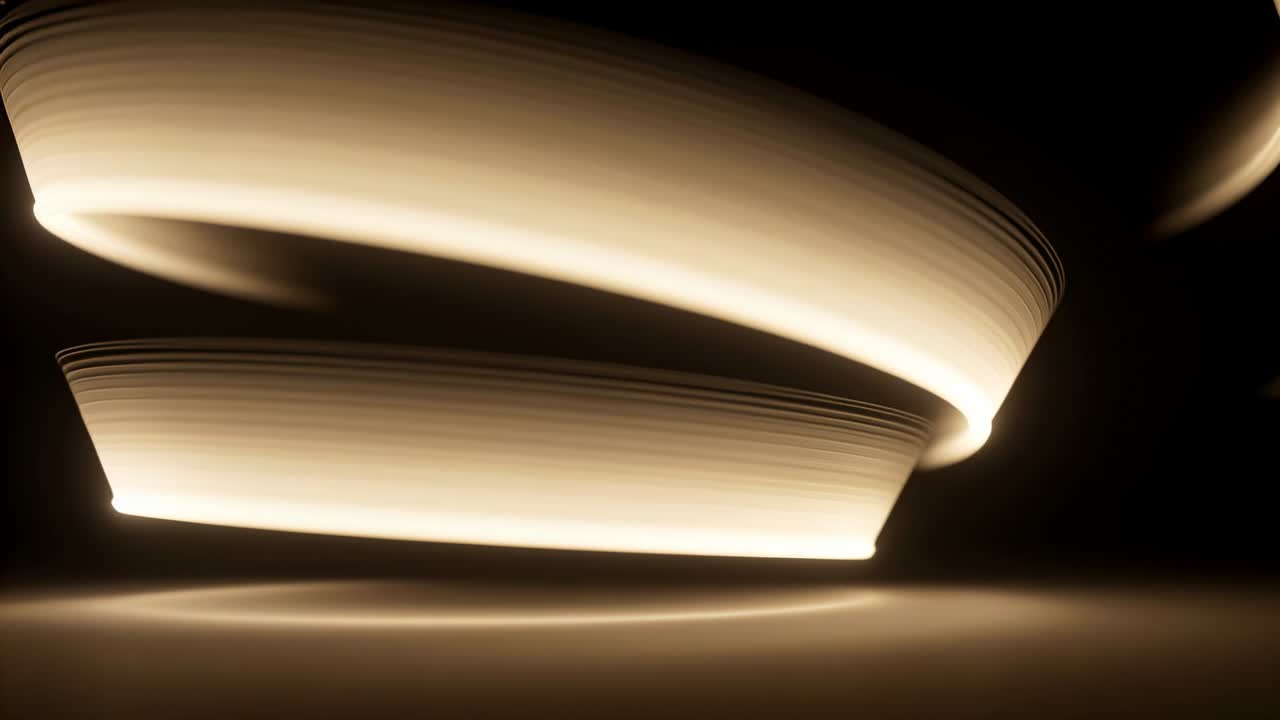 Che appare vicino alla cima, un anello luminoso che si muove e ruota su un piano scuro, formando riflessi impilati.